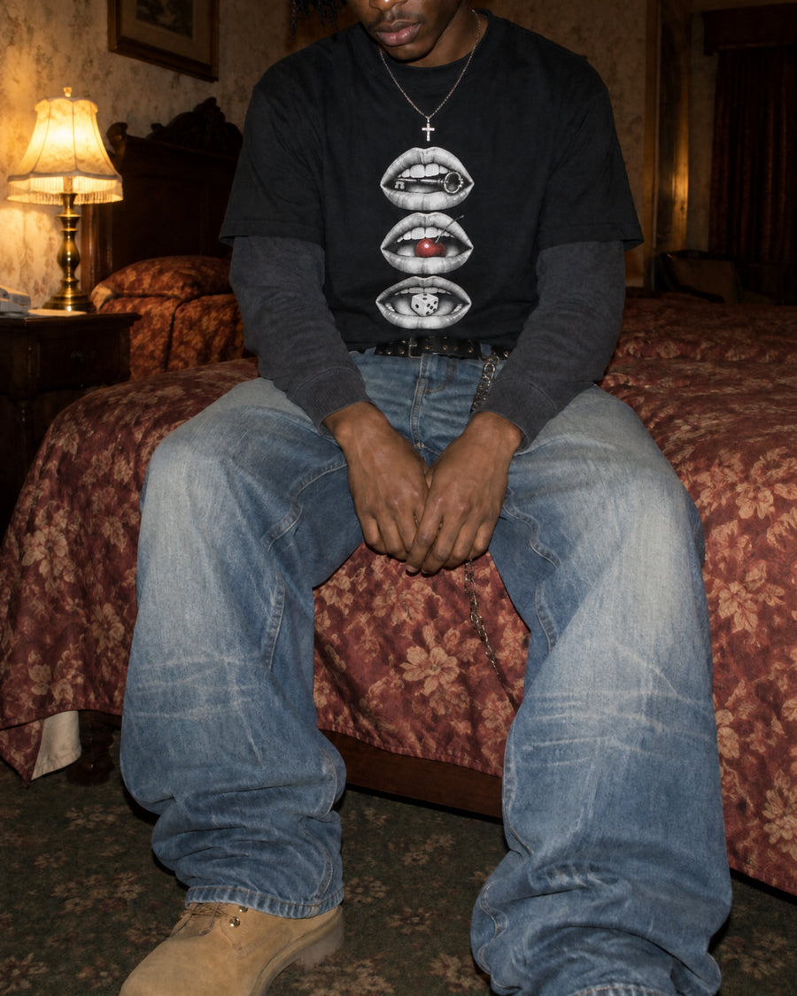 Model in the Three Mouths T-shirt in an old hotel room